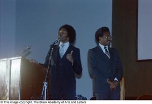 Primary view of object titled '[Black Academy officials presenting at conference]'.