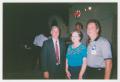 Photograph: [Photo of Howard Dean with two individuals]