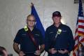 Photograph: [Arlington firefighters Joel B. Lopez and Kevin S. Pittmon receiving …