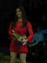 Photograph: [Miss Dragonfly contestant holding trophy and roses]