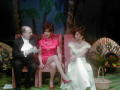 Photograph: [Tim and Davana sitting with contestant]