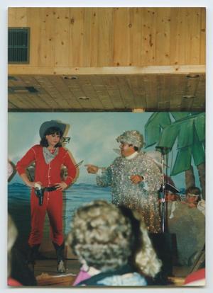 Primary view of object titled '[Photograph of a Peter Pan cast member with Tinker Bell]'.