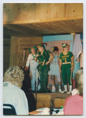 Primary view of object titled '[Photograph of four Peter Pan cast members]'.