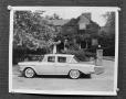 Primary view of [Automobile parked outside a house]