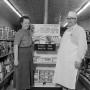Photograph: [Cook Book Cake display at Moore Grocery]