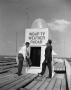 Photograph: [Rupert Bogan and Bob Gould next to the WBAP-TV weather radar]