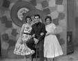 Photograph: [Johnny Desmond with two girls on Teen-Age Downbeat]