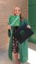 Photograph: [Courtney Parrish with graduation cap]