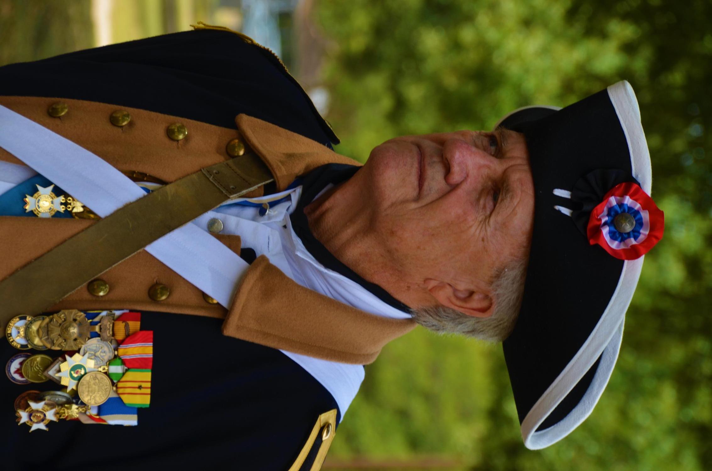 [Compatriot in uniform with several medals at Jester Park]
                                                
                                                    [Sequence #]: 1 of 1
                                                