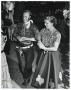 Photograph: [Photograph of Jacques Fath with Billie Marcus at a Western party]