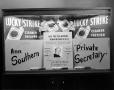 Photograph: [Photo of Lucky Strike Cigarettes window display]