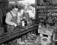 Photograph: [Photo of two men at Blacksmith Shop]