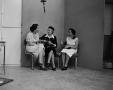 Photograph: [Photo of three women seated together]