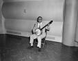 Photograph: [Photograph of man playing a banjo]