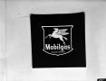 Photograph: [Photo of Mobilgas sign]