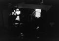 Photograph: [Photograph of an interior, underexposed]
