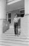 Photograph: [Photograph of Byrd III posing on porch steps]