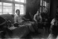 Photograph: [Photograph of Charles and John Williams sitting in a living room]