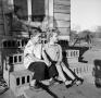 Photograph: [Photograph of Carol and Tim Williams sitting on steps]