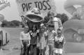 Photograph: [Ronald McDonald and H.R. Pufnstuf with children]