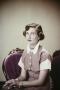 Photograph: [Photograph of Doris Stiles Williams posing on a couch, 3]