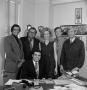 Photograph: [Six individuals in an office]