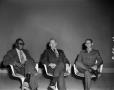 Photograph: [Three men sitting in chairs]