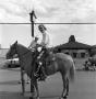 Photograph: [Don Harris riding a horse]