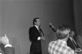 Photograph: [Harold Taft standing behind a podium]