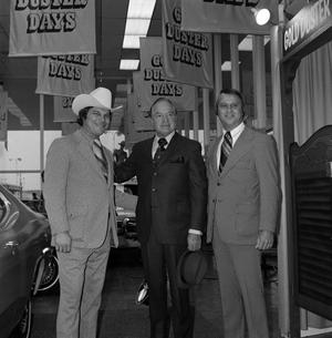 Primary view of object titled '[Bob Hope standing between two men]'.