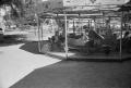 Photograph: [Photograph of Carol and Tim Williams on a carnival ride]