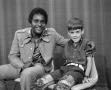 Primary view of [Charley Pride and a young child with MDS, 2]
