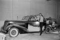 Photograph: [Roy Eaton with an old car]