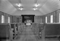 Photograph: [Photograph of the sanctuary of the Church of Christ in Poteet, Texas]