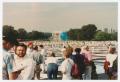 Photograph: [People surrounding the AIDS Memorial Quilt]
