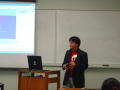 Image: [Daniel Liu during presentation at APAEC]