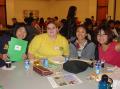 Image: [Students sitting at a table during APAEC]