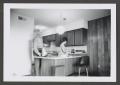 Photograph: [Photograph of Doris and Byrd Williams III in a kitchen]