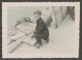 Photograph: [Photograph of Tim Williams on a dock]