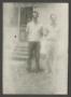 Photograph: [Byrd III and John Williams standing outside]