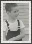Photograph: [Photograph of Tim Williams in overalls, 5]
