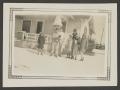 Photograph: [Charles, John, Byrd III, and Irene posing in a snowy lawn]