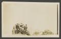 Photograph: [Group of people on a hill]