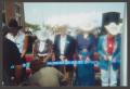 Photograph: [Sue Pirtle and others cutting ribbon]