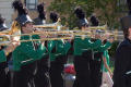 Photograph: [Mean Green Brigade trombone players in UNT Homecoming Parade, 2007]