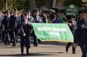 Primary view of object titled '[AFROTC with banner in UNT Homecoming Parade, 2007]'.