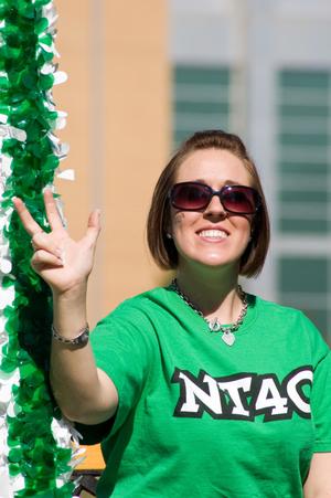 Primary view of object titled '[NT 40 member on float in UNT Homecoming Parade, 2007]'.