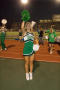 Photograph: [UNT cheerleader jumping at homecoming, 2007]