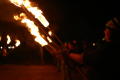 Photograph: [Row of Talons members with torches]