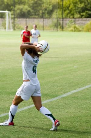 Primary view of object titled '[Brittany Cleveland throwing ball in]'.